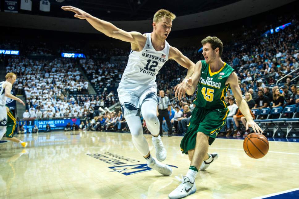 Chris Detrick  |  The Salt Lake Tribune
Brigham Young Cougars forward Eric Mika (12) guards San Francisco Dons guard Mladen Djordjevic (45) during the game at the Marriott Center Thursday January 12, 2017.