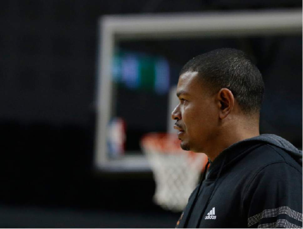 Phoenix Suns head coach Earl Watson looks on during a training session the day before their game against the Dallas Mavericks, at Mexico City Arena in Mexico City, Wednesday, Jan. 11, 2017. (AP Photo/Rebecca Blackwell)