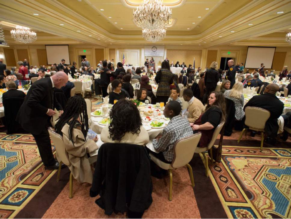 Steve Griffin / The Salt Lake Tribune

Guests find their seats at the annual NAACP Martin Luther King Day luncheon, held at the Little America Hotel in Salt Lake City Monday, Jan. 16, 2017.
