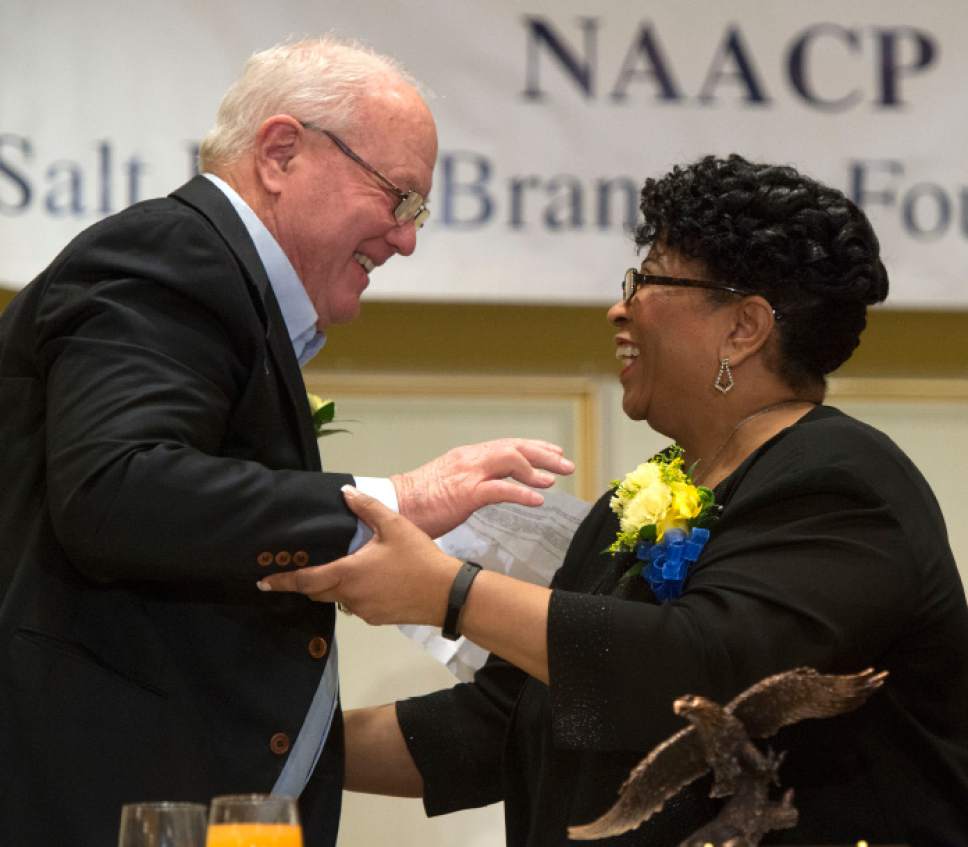 Steve Griffin | The Salt Lake Tribune

Ron McBride hugs Salt Lake NAACP Branch President Jeanetta Williams as he is announced as this year's Dr. Martin Luther King Jr. Award recipient. The annual NAACP Martin Luther King Day luncheon was held at the Little America Hotel in Salt Lake City Monday, Jan. 16, 2017.