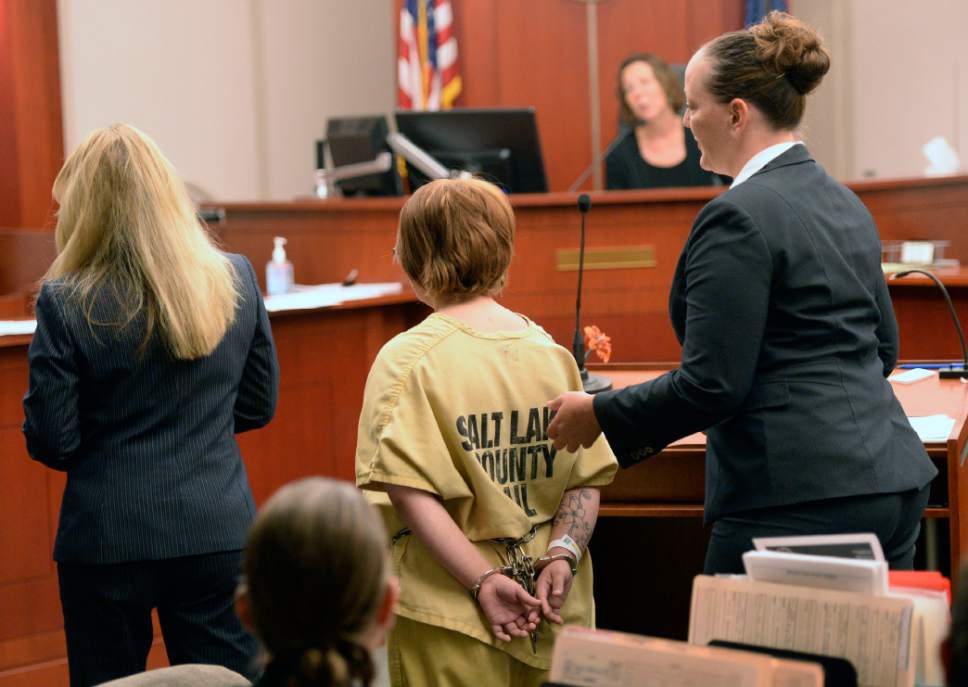 Al Hartmann  |  The Salt Lake Tribune
Alicia Englert, accused of throwing her baby in the trash, makes her initial appearance in Judge Ann Boyden's courtroom in Salt Lake City in September 2014. Her defense lawyers Susanne Gustin, left, Melissa Fulkerson, right. She is charged with attempted murder.