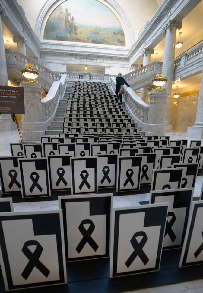 Al Hartmann  |  The Salt Lake Tribune 
Markers representing the 280 lives lost on Utah roads in 2016 line the stairway at the Utah State Capitol rotunda Wednesday Jan 18.  It's a memorium to serve as a reminder to put safety first while driving.