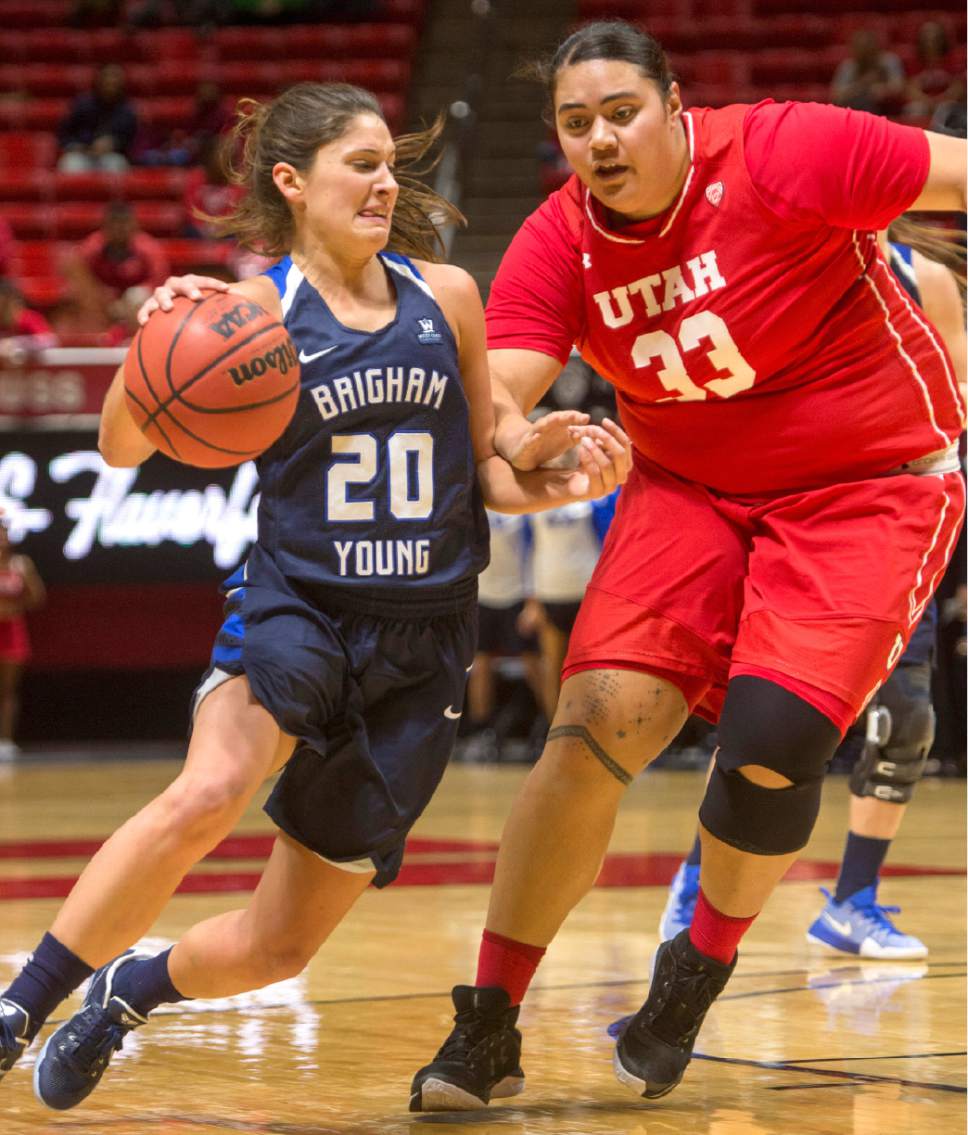 Rick Egan  |  The Salt Lake Tribune

Brigham Young Cougars guard Cassie Broadhead (20) goes one-on-one with Utah Utes center Joeseta Fatuesi (33), in Basketball action, Brigham Young Cougars vs. the Utah Utes, Saturday, December 10, 2016.