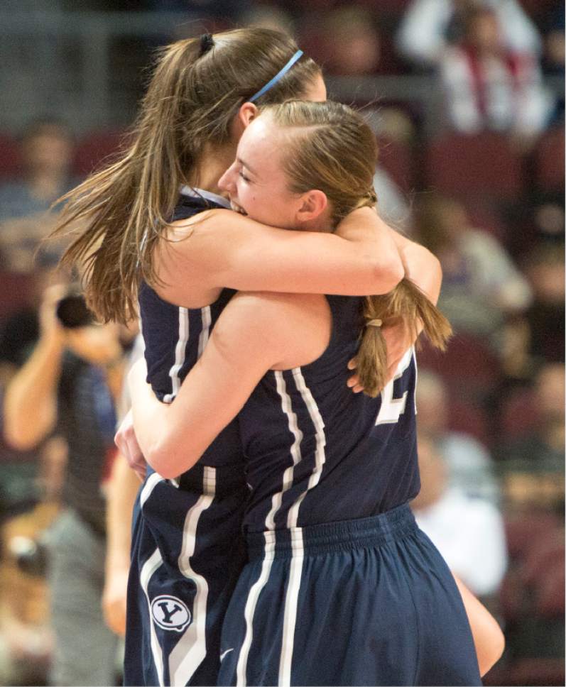 Rick Egan  |  The Salt Lake Tribune

Brigham Young Cougars guards Lexi Eaton (21) and Cassie Broadhead (20) celebrate at the buzzer as the Lady Cougars upset the Gonzaga Bulldogs in the West Coast Conference Basketball Championships at the Orleans Arena in Las Vegas, Monday, March 9, 2015.