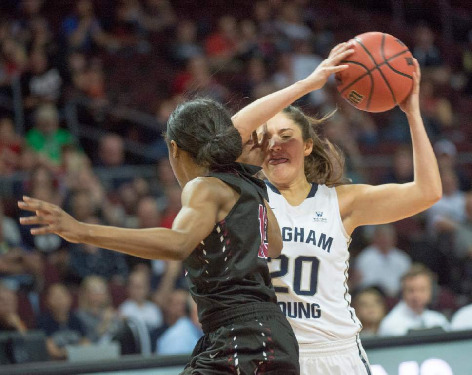 Rick Egan  |  The Salt Lake Tribune

Santa Clara Broncos guard Kyla Martin (12) tries to stop Brigham Young Cougars guard Cassie Broadhead (20) in basketball action in the West Coast Conference Semifinals, at the Orleans Arena in Las Vegas, Saturday, March 7, 2016.