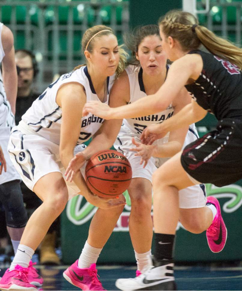 Rick Egan  |  The Salt Lake Tribune

Brigham Young Cougars Kalani Purcell (32) and Cassie Broadhead (20) go for a loose ball along with Santa Clara Broncos guard Savanna Hanson (24), in basketball action in the West Coast Conference Semifinals, at the Orleans Arena in Las Vegas, Saturday, March 7, 2016.