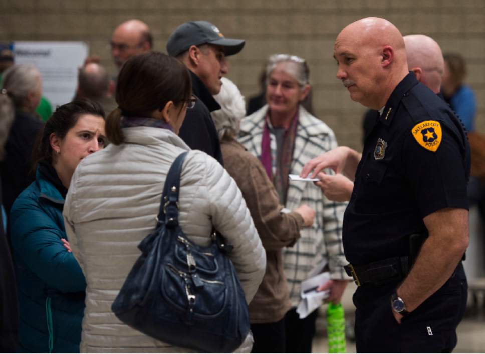 Steve Griffin / The Salt Lake Tribune

Salt Lake City Police Chief Mike Brown talks with residents during their final chance to influence the design and imprint of four 150-bed homeless shelters through community workshops organized by city administrators. The city has invited suggestions in advance of hiring an architect and entering zoning and conditional use processes that may take up to a year and a half at some sites, including the controversy-ridden 653 E. Simpson Ave. location. The event was held at the Nibley Park Elementary School Auditorium in Salt Lake City Wednesday January 18, 2017.