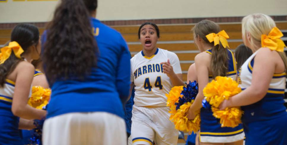 Steve Griffin / The Salt Lake Tribune

Alyzae Patane gets excited as she is introduced prior to the Taylorsville versus Copper Hills girl's basketball game at Taylorsville High School in Taylorsville Tuesday January 17, 2017.