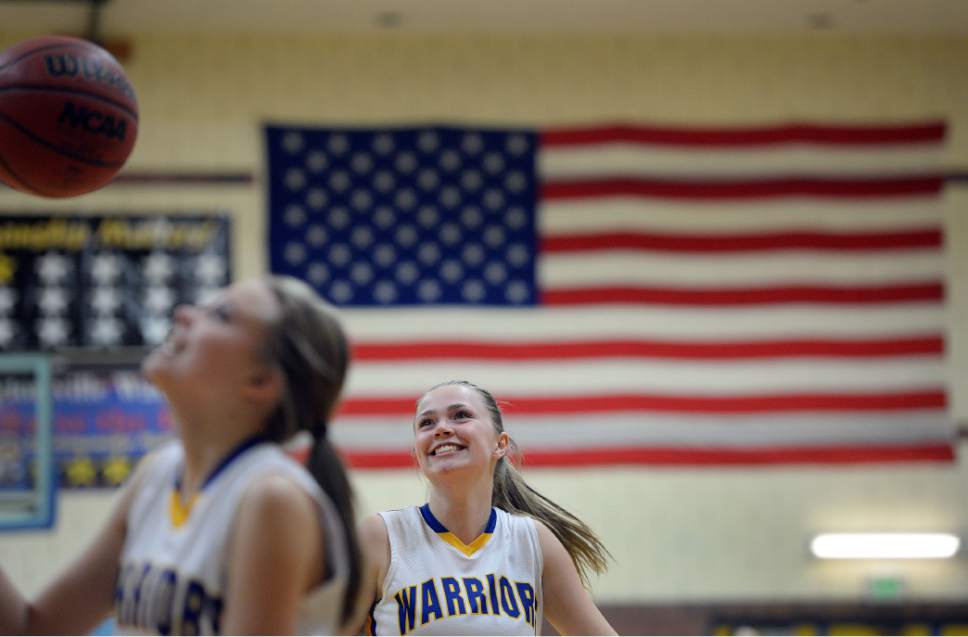Steve Griffin / The Salt Lake Tribune

Taylorsville's Maizy Burbank smiles as she warms-up during girl's basketball game against Copper Hills at Taylorsville High School in Taylorsville Tuesday January 17, 2017.