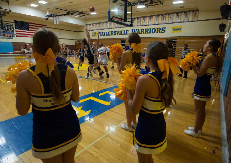 Steve Griffin / The Salt Lake Tribune

Cheerleaders perform on the end line during the Taylorsville versus Copper Hills girl's basketball game at Taylorsville High School in Taylorsville Tuesday January 17, 2017.
