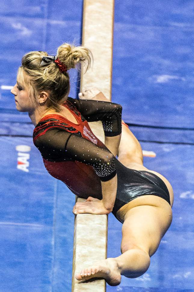 Chris Detrick  |  The Salt Lake Tribune
Utah's Sabrina Schwab competes on the beam during the gymnastics meet against Brigham Young University at the Marriott Center Friday January 13, 2017.