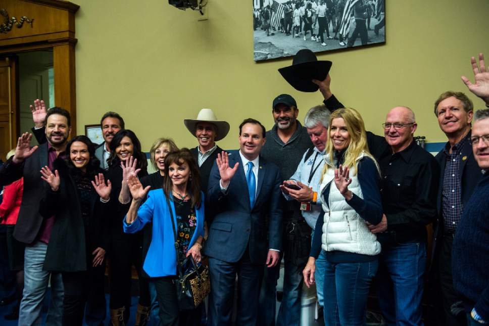 Chris Detrick  |  The Salt Lake Tribune
Sen. Mike Lee, R-Utah, takes a picture with constituents from Utah as they 'wave goodbye to Obama' during a reception in the Oversight Committee Room in the Rayburn House Office Building Thursday January 19, 2017.