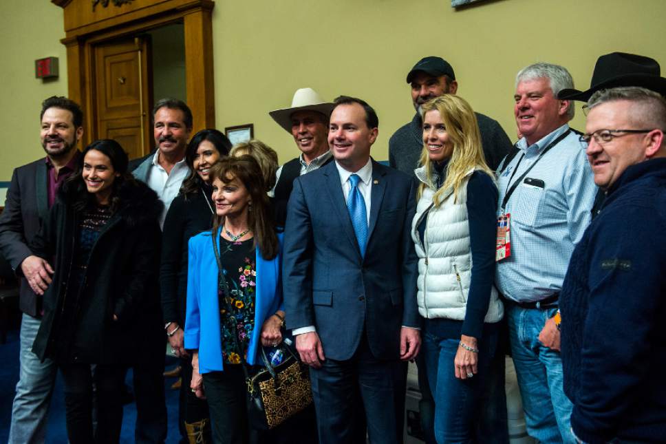 Chris Detrick  |  The Salt Lake Tribune
Sen. Mike Lee, R-Utah, takes a picture with constituents from Utah during a reception in the Oversight Committee Room in the Rayburn House Office Building Thursday January 19, 2017.