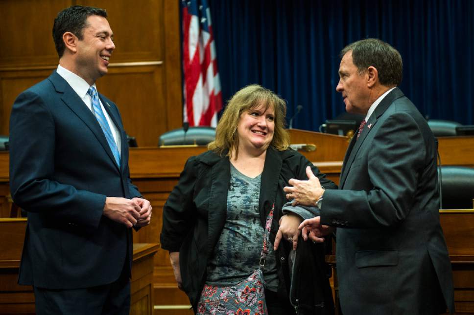 Chris Detrick  |  The Salt Lake Tribune
Tina Urbanik, of Price, talks with Rep. Jason Chaffetz, R-Utah, and Gov. Gary R. Herbert during a reception in the Oversight Committee Room in the Rayburn House Office Building Thursday January 19, 2017.
