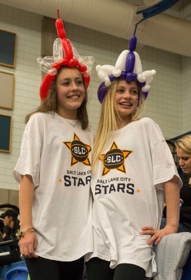 Rick Egan  |  The Salt Lake Tribune

Avian Oliverson and Zoey Sisam pose with their balloon hats and the the shirts they caught in the stands, as the Salt Lake Stars played the Canton Charge, in NBA D League action, at Salt Lake Community College, Saturday, January 7, 2017.