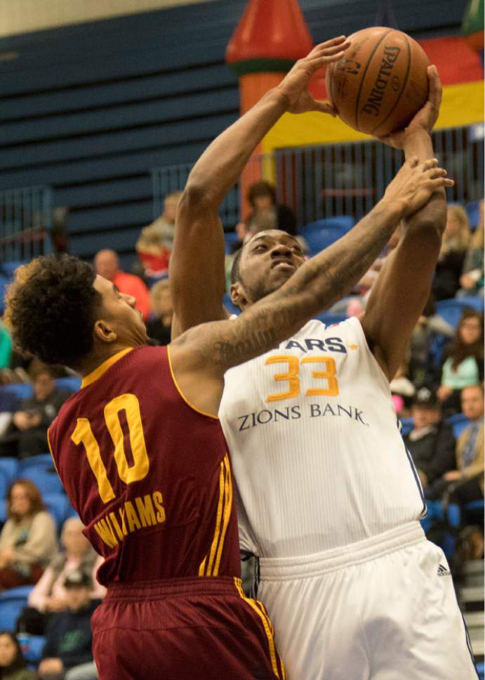 Rick Egan  |  The Salt Lake Tribune

Salt Lake Stars Da'Shonte Riley takes the ball to the hoop, as Mike Williams (10) defends for the Charge, in NBA D League action, at Salt Lake Community College, Saturday, January 7, 2017.