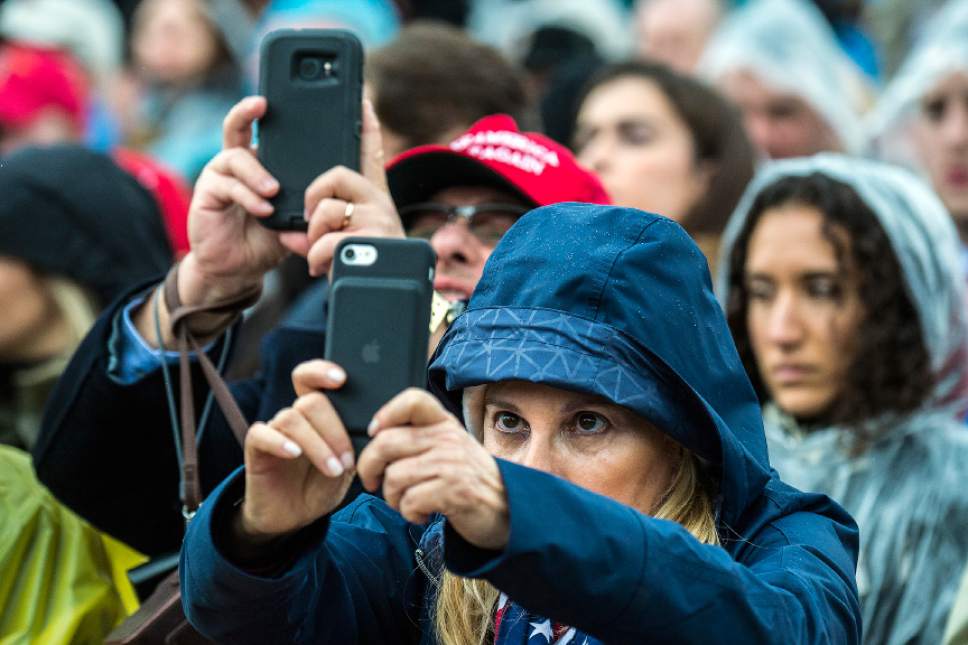 Chris Detrick  |  The Salt Lake Tribune
Members of the take photos as President Trump delivers his inaugural address during the 58th Presidential Inauguration Ceremony at the U.S. Capitol Friday January 20, 2017.