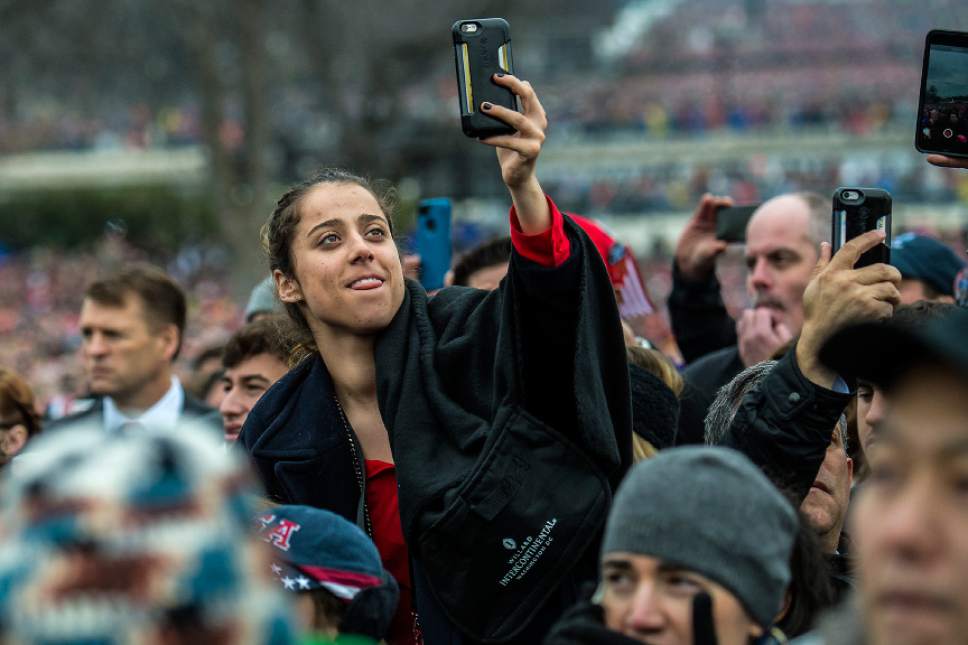 Chris Detrick  |  The Salt Lake Tribune
A woman takes cell phone pictures during the 58th Presidential Inauguration Ceremony at the U.S. Capitol Friday January 20, 2017.