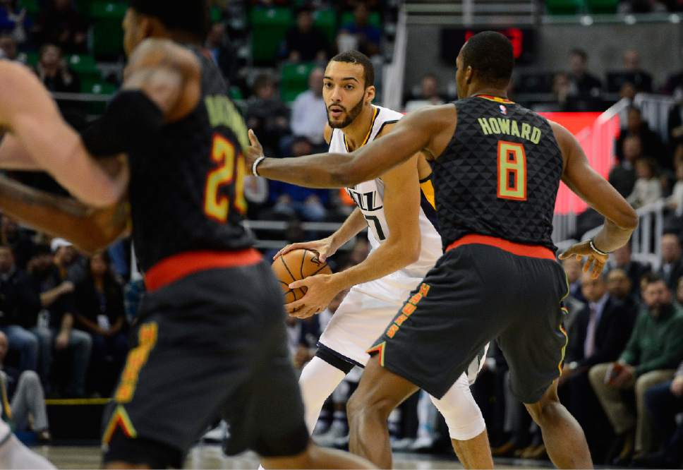 Scott Sommerdorf   |  The Salt Lake Tribune  
Utah Jazz center Rudy Gobert (27) looks for a passing lane during first half play. The Jazz held a 40-30 lead over the Atlanta Hawks during first half play, Friday November 25, 2016.
