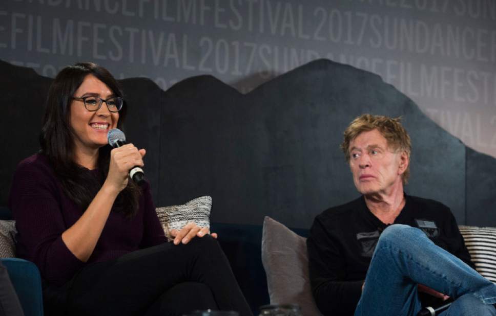Steve Griffin | The Salt Lake Tribune

Sydney Freeland, director of "Deidra & Laney Rob a Train," talks about her time at the Sundance Institute as Robert Redford listens during the opening news conference of the 2017 Sundance Film Festival at the Egyptian Theatre  in Park City on Thursday, Jan. 19, 2017.