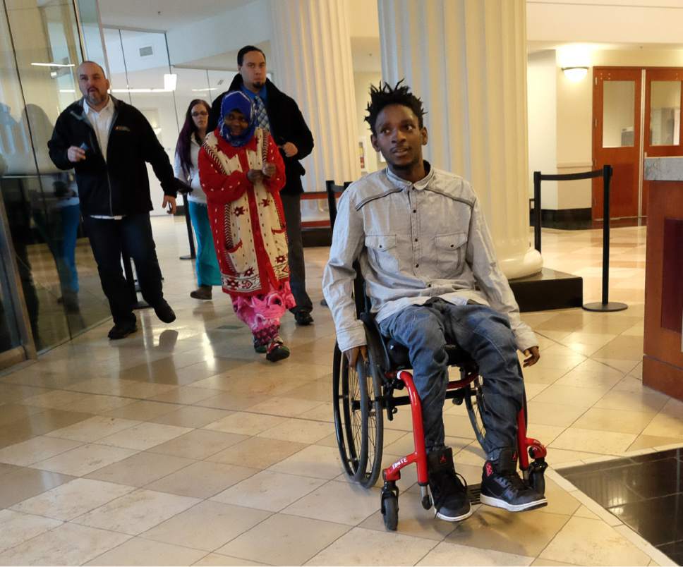 Francisco Kjolseth | The Salt Lake Tribune
Abdullahi "Abdi" Mohamed, who was shot and critically wounded by police last February, leaves the Matheson Courthouse in Salt Lake City on Monday, Jan. 23, 2017, for a preliminary hearing. 'Abdi' was ordered to stand trial for robbery.