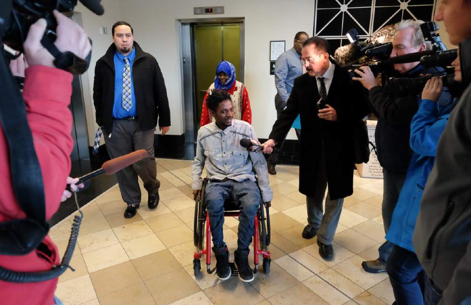 Francisco Kjolseth | The Salt Lake Tribune
Abdullahi "Abdi" Mohamed, who was shot and critically wounded by police last February, leaves the Matheson Courthouse in Salt Lake City on Monday, Jan. 23, 2017, for a preliminary hearing. 'Abdi' was ordered to stand trial for robbery.