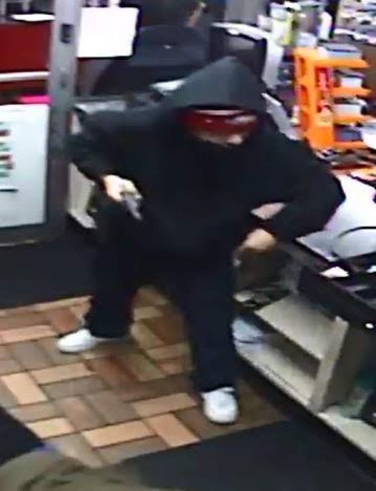 Hunt on for 2 gunmen in shooting of Taylorsville gas station clerk