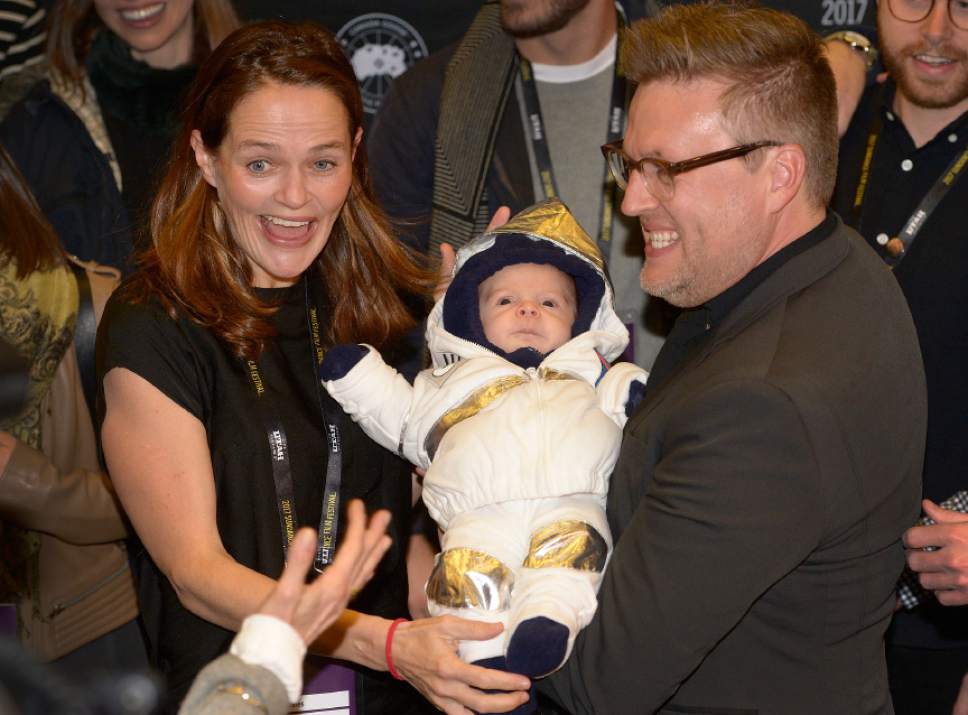 Leah Hogsten  |  The Salt Lake Tribune
ìThe Mars Generation" film executive producer Alexandra Johnes, left, and director Michael Barnett hold Johnes' son Quinn, 7 months, dressed in a spacesuit for the 2017 Sundance Film Festival opener in Salt Lake City for the documentary film. ìThe Mars Generationî is a film about teens who aspire to be astronauts talk about going to Mars ó a goal that may be closer than many people think ó in director Michael Barnettís documentary.