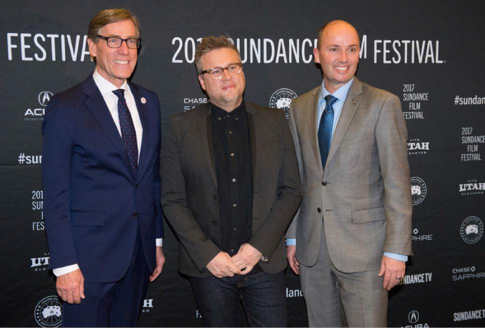 Leah Hogsten  |  The Salt Lake Tribune
l-r Zions Bank President and CEO Scott Anderson, "The Mars Generation" film director Michael Barnett and Lt. Governor Spencer Cox pose for a photo at the 2017 Sundance Film Festival opener in Salt Lake City for the documentary "The Mars Generation," the first time a children's film has been featured. "The Mars Generation" is a film about teens who aspire to be astronauts talk about going to Mars -- a goal that may be closer than many people think -- in director Michael Barnett's documentary.