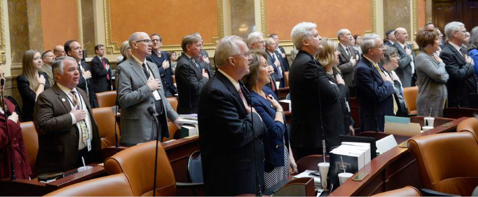 Al Hartmann  |  The Salt Lake Tribune
Members of the House of Representatives stand for the Pledge of Allegiance and flag ceremony Monday Jan. 23 during the first day of the 2017 Legislative session at the Utah State Capitol.