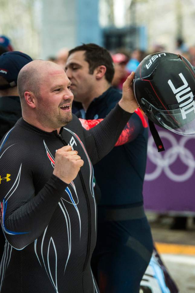 KRASNAYA POLYANA, RUSSIA  - JANUARY 23:
USA's pilot Steven Holcomb celebrates after the four-man bobsled at Sanki Sliding Center during the 2014 Sochi Olympics Sunday February 23, 2014. They won the bronze medal with a cumulative time of 3:40.99. 
(Photo by Chris Detrick/The Salt Lake Tribune)