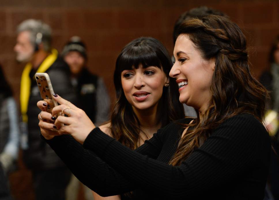 Francisco Kjolseth | The Salt Lake Tribune
Hannah Simone, left, and Angelique Cabral take a selfie as they attend the premiere of "Band Aid," at the Eccles Theatre as part of 2017 Sundance Film Festival in Park City on Tuesday, Jan. 24, 2017.