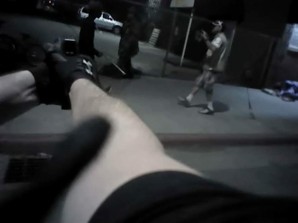 In this screen grab from the body cam video of Salt Lake City police officer Jordan Winegard, Abdullahi "Abdi" Mohamed can be seen approaching Kelly Mcrae, right, during an altercation on Rio Grande Street in Feb. 2016.