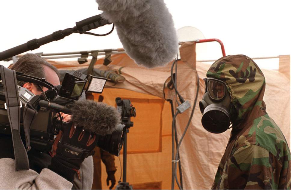 Tribune file photo

A crew from CNN interviews a soldier at Dugway's field demonstration on Dec. 8, 1997. Dugway demonstrated new technologies for sampling, detecting and detecting biological weapons.