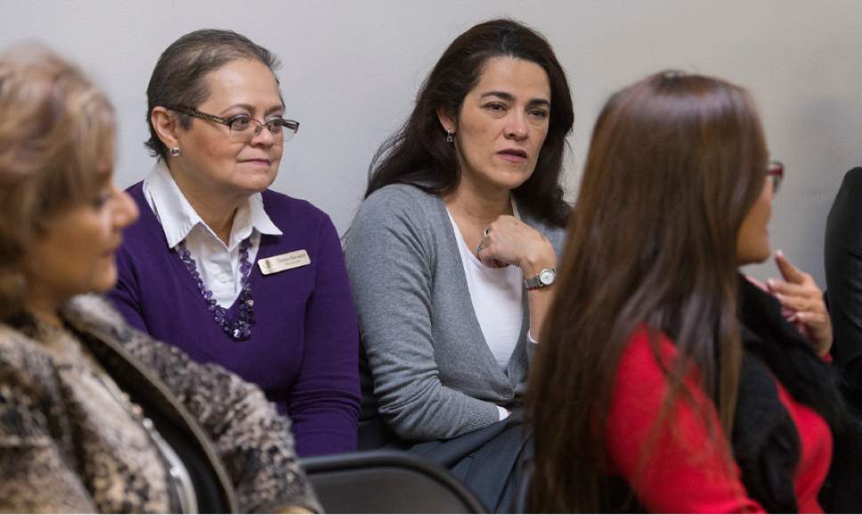 Leah Hogsten  |  The Salt Lake Tribune
l-r Teresa Salazar with the consulate and Sara Carbajal with the Alliance Community Services listen as immigration attorney Marlene Gonzalez (right) shares legal issues affecting potential clients of VAIM.  VAIM will seek to create and maintain close partnerships with social, educational and governmental organizations that work in favor of Mexican and Latina women in the states of Utah and Wyoming.The Consulate of Mexico in Salt Lake City launched a new service focusing on women's issues, called la Ventanilla de Atención Integral a la Mujer  or VAIM (Comprehensive Attention Window for Women). VAIM is aimed to bring together efforts to meet the needs of women in the Hispanic community, including health, legal assistance, education, community services and others. VAIM's goal is to provide the necessary tools to promote the independence and community empowerment of women migrants, taking into account their particular circumstances and, if applicable, their situation of vulnerability.