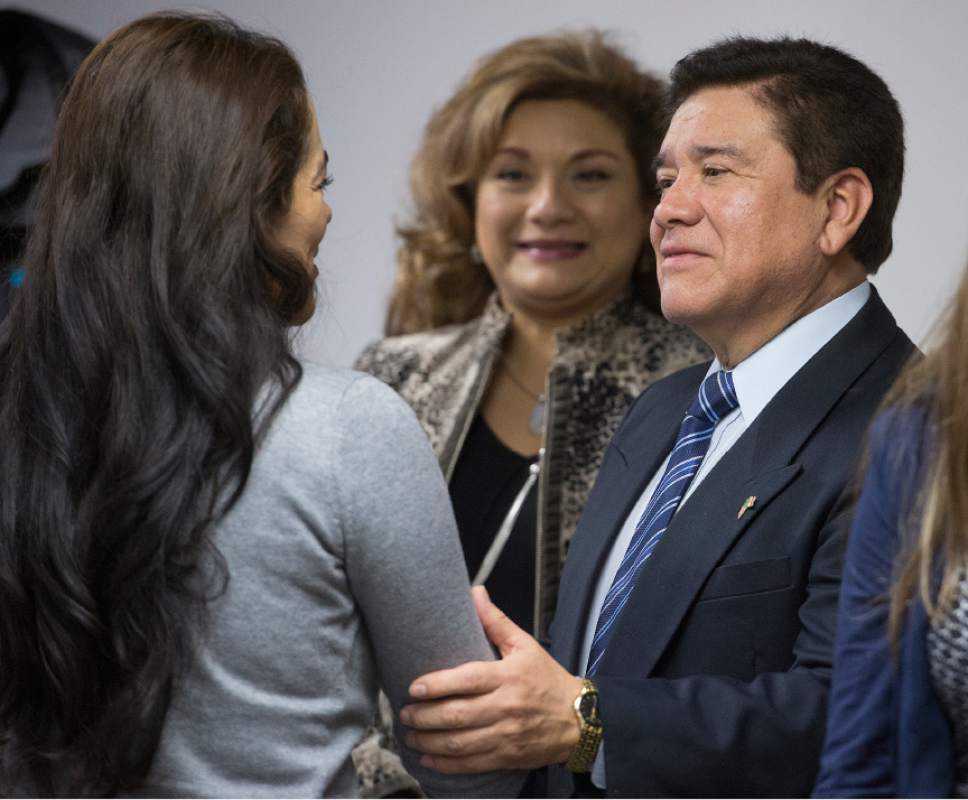 Leah Hogsten  |  The Salt Lake Tribune
Sara Carbajal, left, greets Javier Chagoya, the consul for Mexico in Salt Lake City at the unveiling of la Ventanilla de AtenciÛn Integral a la Mujer or VAIM (Comprehensive Attention Window for Women) at the consulate on Wednesday. VAIM is aimed to bring together efforts to meet the needs of women in the Hispanic community.