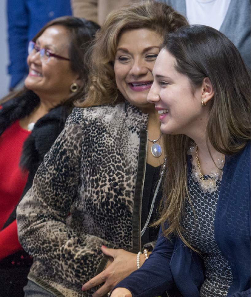 Leah Hogsten  |  The Salt Lake Tribune
Elena Bensor, center, and Iliana Gomez attend a launch event for a new service focusing on women's issues, called la Ventanilla de AtenciÛn Integral a la Mujer, or VAIM (Comprehensive Attention Window for Women). VAIM is aimed to bring together efforts to meet the needs of women in the Hispanic community, including health, legal assistance, education, community services and others.