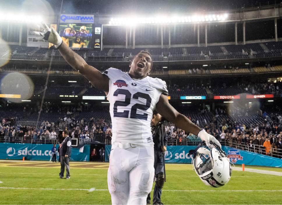Rick Egan  |  The Salt Lake Tribune

Brigham Young Cougars running back Squally Canada (22) celebrates as BYU defeated Wyoming 24-21in the Poinsettia Bowl, at Qualcomm Stadium in San Diego, December 21, 2016.