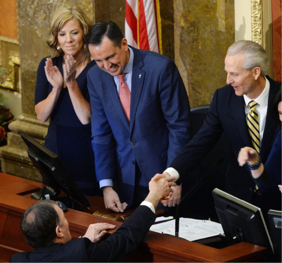 Steve Griffin / The Salt Lake Tribune

Utah Gov. Gary Herbert shakes hands with Senate President Wayne Niederhauser and House Speaker Greg Hughes as he prepares to give the State of the State address from the House of Representatives at the State Capitol in Salt Lake City Wednesday January 25, 2017.