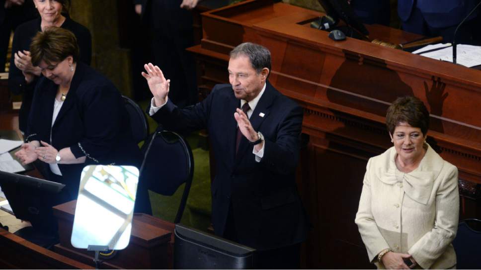 Steve Griffin / The Salt Lake Tribune

Utah Gov. Gary Herbert shakes hands with Senate President Wayne Niederhauser acknowledges the applause  as he prepares to give the State of the State address from the House of Representatives at the State Capitol in Salt Lake City Wednesday January 25, 2017.