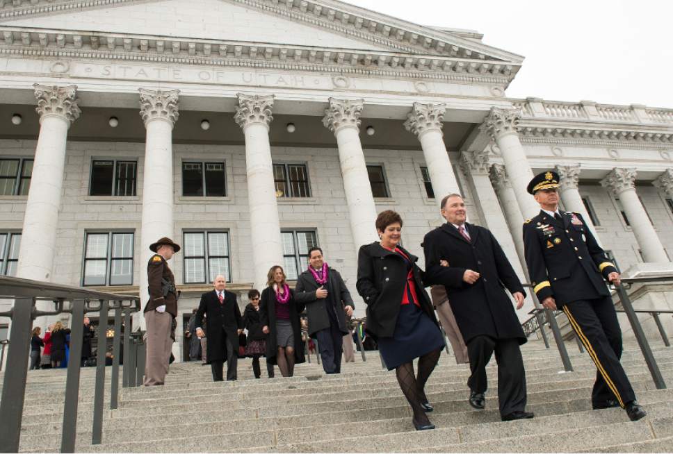 Leah Hogsten  |  The Salt Lake Tribune
l-r Utah First Lady Jeanette Herbert, Gov. Gary Herbert and Major General Jeff Burton leave the Utah Capitol at the conclusion of the 2017 State Inaugural Ceremony, January 4, 2017.