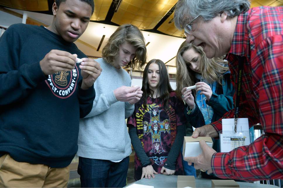 Al Hartmann  |  The Salt Lake Tribune
Dr. James Porter, right, shows Brighton High School students examples of corals after watching a screening thuesday of the Sundance documentary "Chasing Cora,l" about the death of the earth's coral reefs.