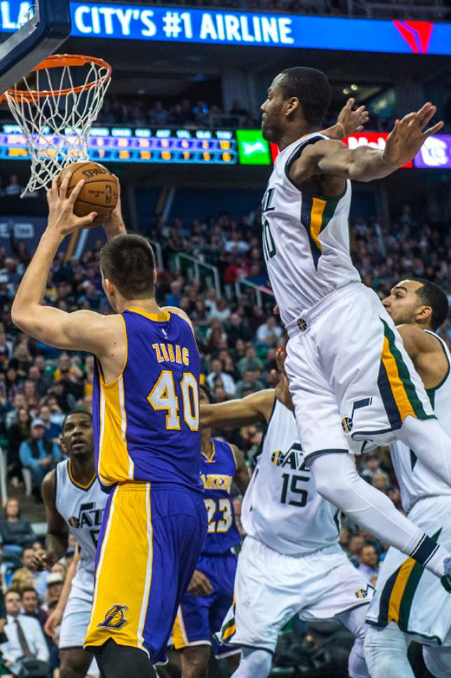 Chris Detrick  |  The Salt Lake Tribune
Utah Jazz guard Alec Burks (10) goes up to block Los Angeles Lakers center Ivica Zubac (40) during the game at Vivint Smart Home Arena Thursday January 26, 2017. Burks was called for a foul.