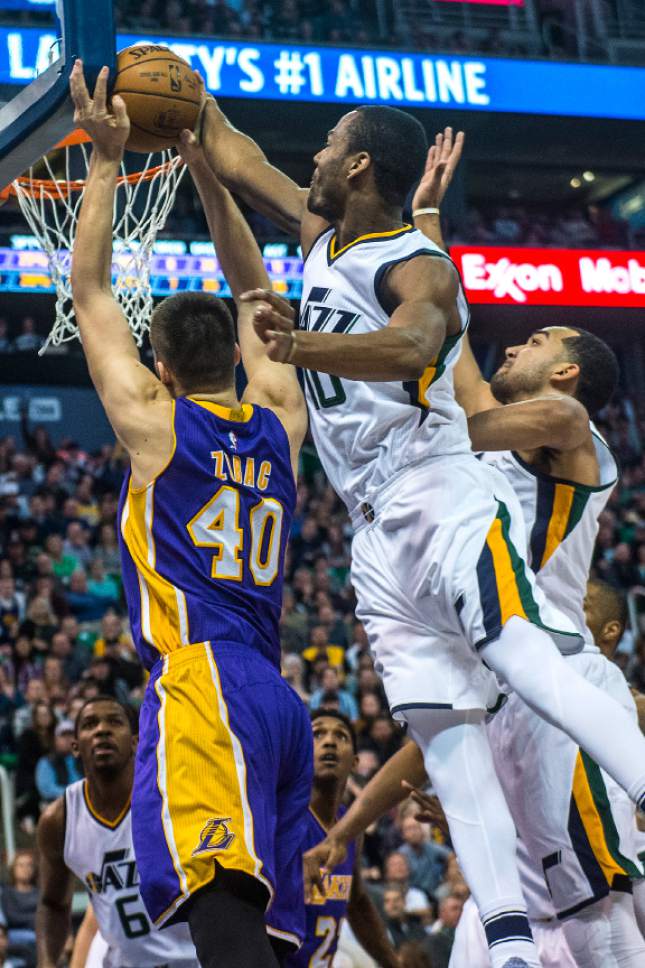 Chris Detrick  |  The Salt Lake Tribune
Utah Jazz guard Alec Burks (10) goes up to block Los Angeles Lakers center Ivica Zubac (40) during the game at Vivint Smart Home Arena Thursday January 26, 2017. Burks was called for a foul.