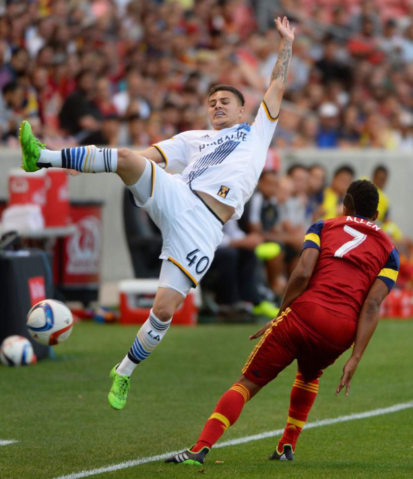 Steve Griffin  |  The Salt Lake Tribune


Los Angeles Galaxy forward Raul Mendiola (40) sails through the air as he gets upended by Real Salt Lake defender/midfielder Jordan Allen (7) during the Real Salt Lake vs. L.A. Galaxy, U.S. Open Cup match at Rio Tinto Stadium in Sandy, Tuesday, July 14, 2015.