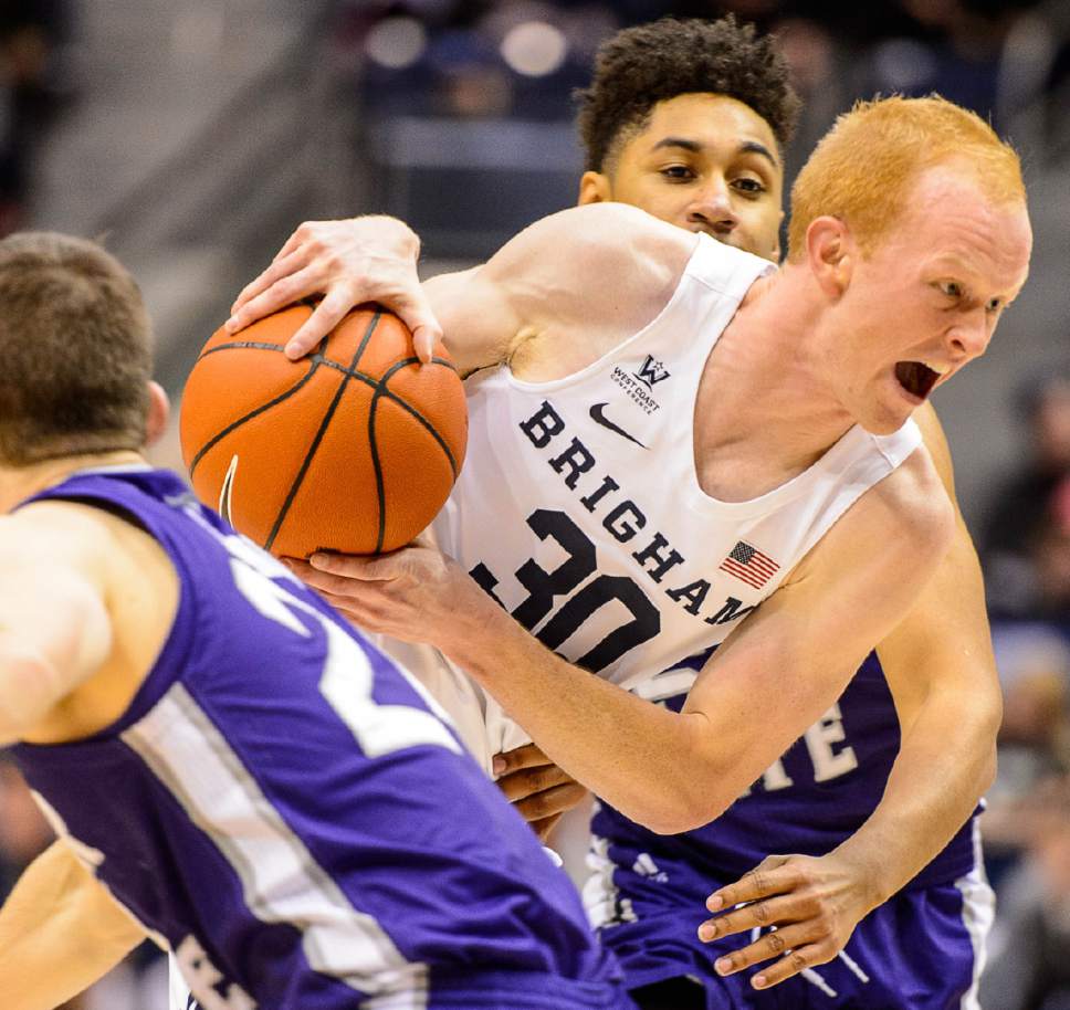 Trent Nelson  |  The Salt Lake Tribune
Brigham Young Cougars guard TJ Haws (30) drives to the basket as BYU hosts Weber State, NCAA basketball at the Marriott Center in Provo, Wednesday December 7, 2016.