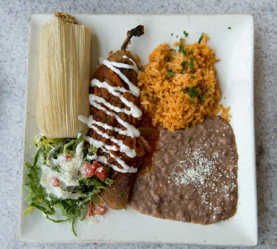 Rick Egan  |  The Salt Lake Tribune

The two-item combination platter with chile relleno and chicken tamale, rice and beans, at Chile-Tepin, a new Mexican restaurant, 307 W. 200 South, Salt Lake City.