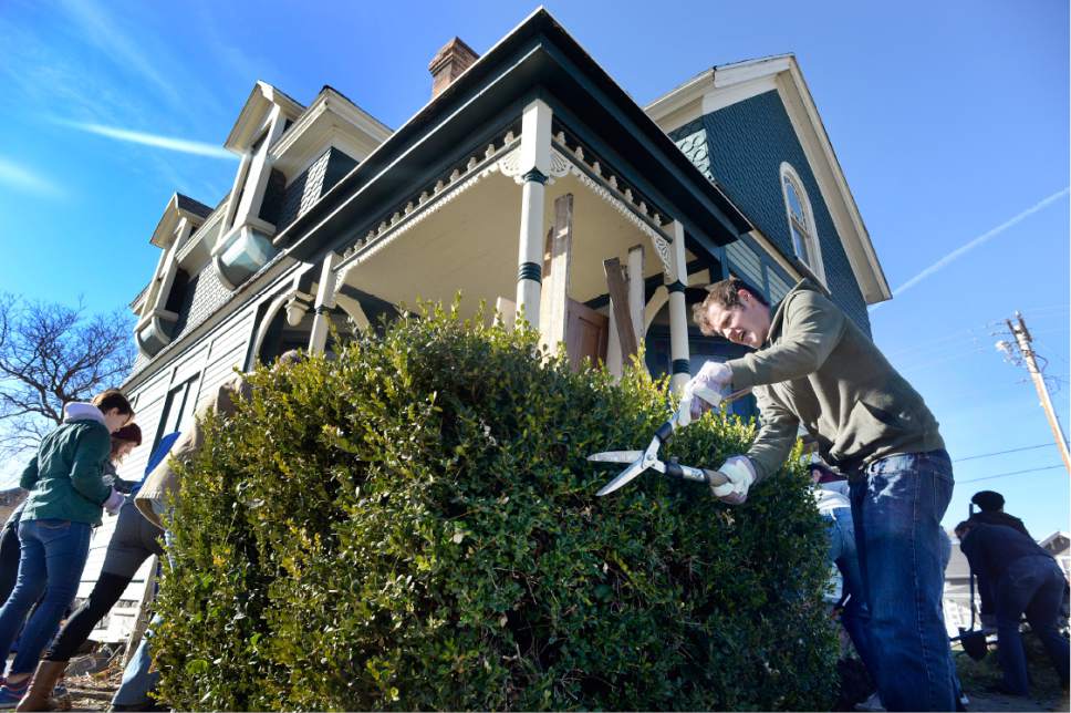 Scott Sommerdorf   |  The Salt Lake Tribune  
Volunteers doing landscaping and other work, surround the old Victorian home being renovated to house "Encircle House" which will be Provo's first LGBT resource center, Saturday November 19, 2016.