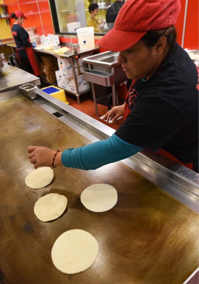 Francisco Kjolseth | The Salt Lake Tribune
Rubicela Garcia makes corn tortillas by hand at Red Iguana 2.