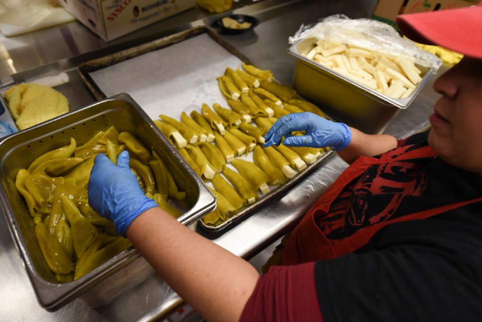 Francisco Kjolseth | The Salt Lake Tribune
Rocio Leal assembles chile rellenos in preparation for the day's crowds at Red Iguana 2. One of Utah's most decorated restaurants, winning both local and national awards for its "Killer Mexican Food," Red Iguana 2 has recently expanded their kitchen and dining space.